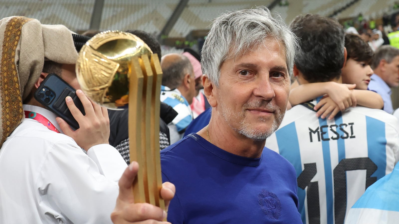 LUSAIL CITY, QATAR - DECEMBER 18: Jorge Messi, father and agent of Lionel Messi - holding his son's trophy of 'Best player of the World Cup - following the FIFA World Cup Qatar 2022 Final match between Argentina and France at Lusail Stadium on December 18, 2022 in Lusail City, Qatar. (Photo by Jean Catuffe/Getty Images)