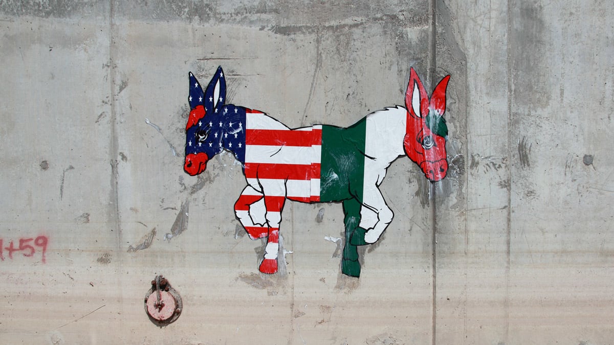 articles/2011/06/30/billboard-liberation-artistically-redesigning-the-u-s-mexico-border-fence/mexico-border-art-curtis-topbox_a0qopn