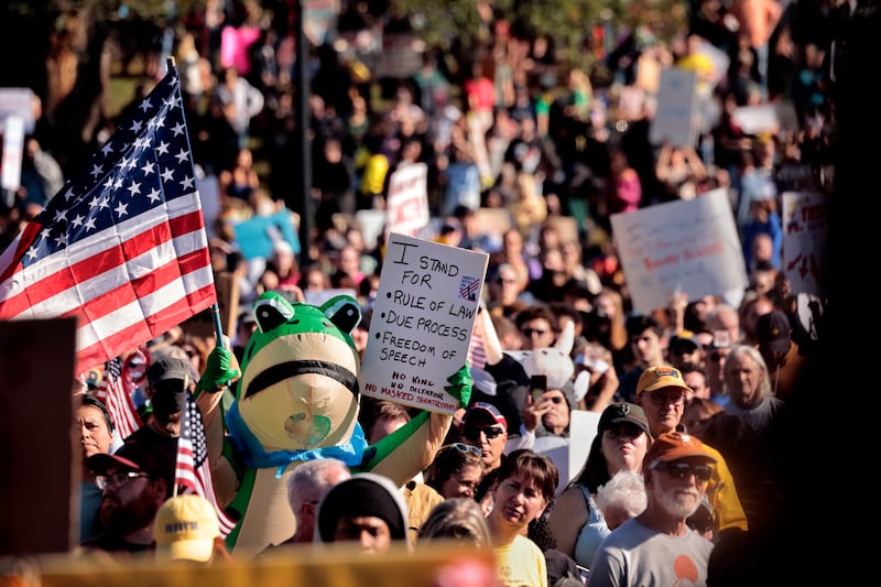 A protester wore an inflatable frog costume during the No Kings rally on Boston
