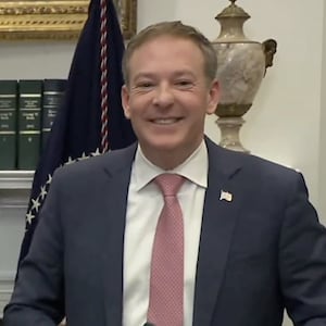 EPA Administrator Lee Zeldin, right, smiled awkwardly after President Donald Trump called his speech, during which he closed his eyes for extended periods, “long.”