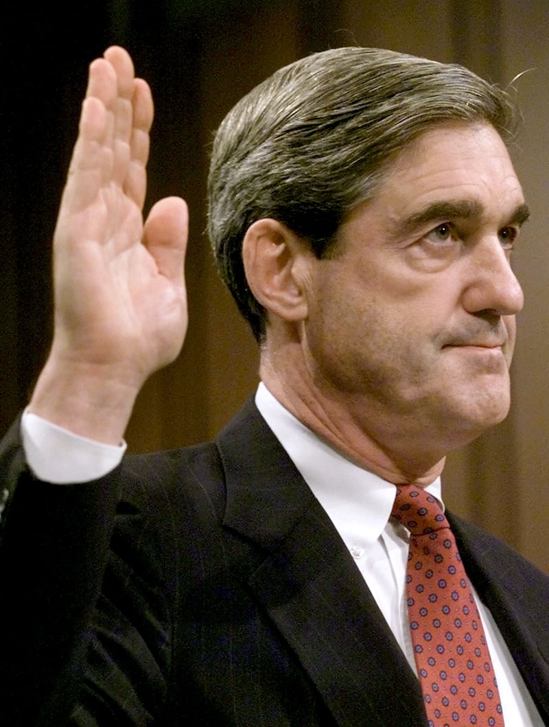 F.B.I. Director nominee Robert Mueller is sworn in prior to testifying
before the Senate Judiciary Committee during a confirmation hearing
July 30, 2001.
