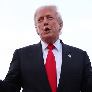 JOINT BASE ANDREWS, MARYLAND - NOVEMBER 09: U.S. President Donald Trump gives brief remarks to members of the press after exiting Air Force One on November 9, 2025 at Joint Base Andrews, Maryland. Trump spent the weekend at his Mar-A-Lago estate in Palm Beach, Florida. (Photo by Tasos Katopodis/Getty Images)