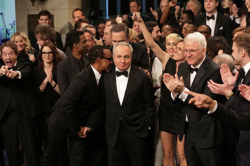 SATURDAY NIGHT LIVE 40TH ANNIVERSARY SPECIAL -- Pictured: (l-r) Martin Short, Tina Fey, Chris Rock, tim Meadows, Lorne Michaels, Miley Cyrus, Molly Shannon, Steve Martin during the Goodnights & Credits on February 15, 2015 -- (Photo by: Chris Haston/NBCU Photo Bank/NBCUniversal via Getty Images via Getty Images)
