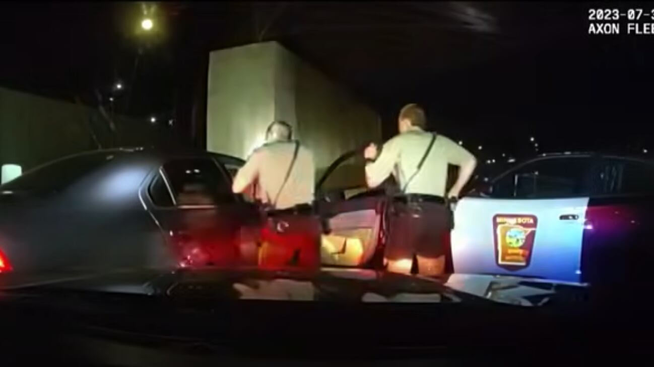 A screenshot from body cam video taken of Minnesota State troopers holding Ricky Cobb at gunpoint.