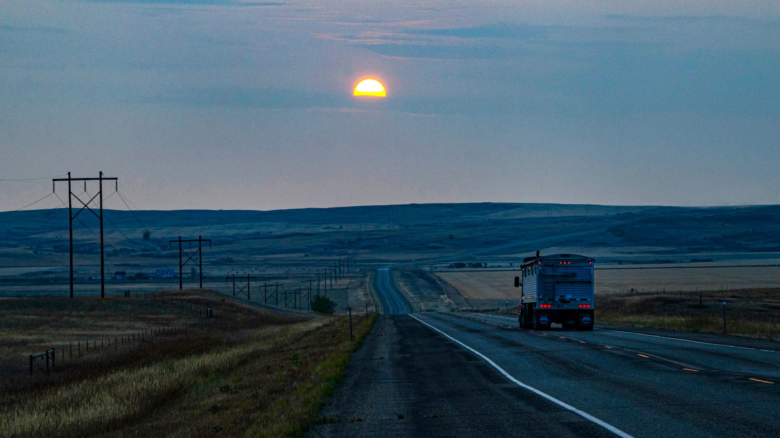 North America, USA, Montana, Wolf Point. Sunrise in Forest Fire Smoke.
