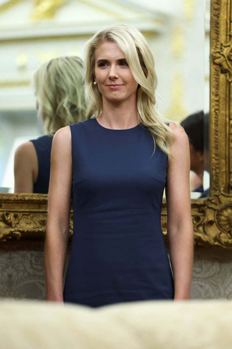 US President Donald Trump's executive assistant Natalie Harp attends the announcement of a Minnesota company's plan to build a $15 billion steel mill in Iowa, at the Oval Office at the White House in Washington, D.C., US, September 28, 2026. REUTERS/Kevin Lamarque