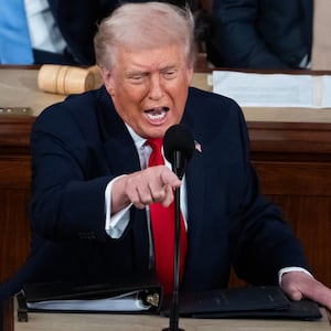 President Donald Trump delivers his State of the Union address in the House Chamber of the U.S. Capitol on Tuesday, February 24, 2026. Vice President JD Vance, left, and Speaker of the House Mike Johnson, R-La., also appear.