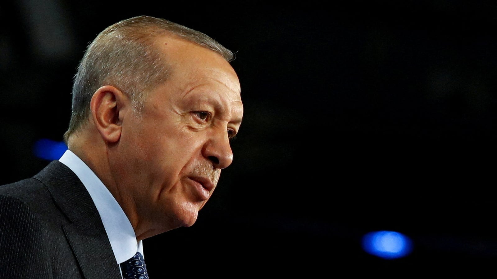 Recep Tayyip Erdogan speaks on stage.