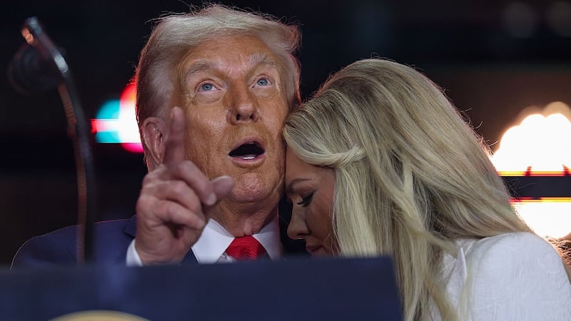 Erika Kirk joins U.S. President Donald Trump onstage during the memorial service for political activist Charlie Kirk at State Farm Stadium on September 21, 2025 in Glendale, Arizona. Kirk, the CEO and co-founder of Turning Point USA, was shot and killed on September 10th while speaking at an event during his "American Comeback Tour" at Utah Valley University. (Photo by Win McNamee/Getty Images)