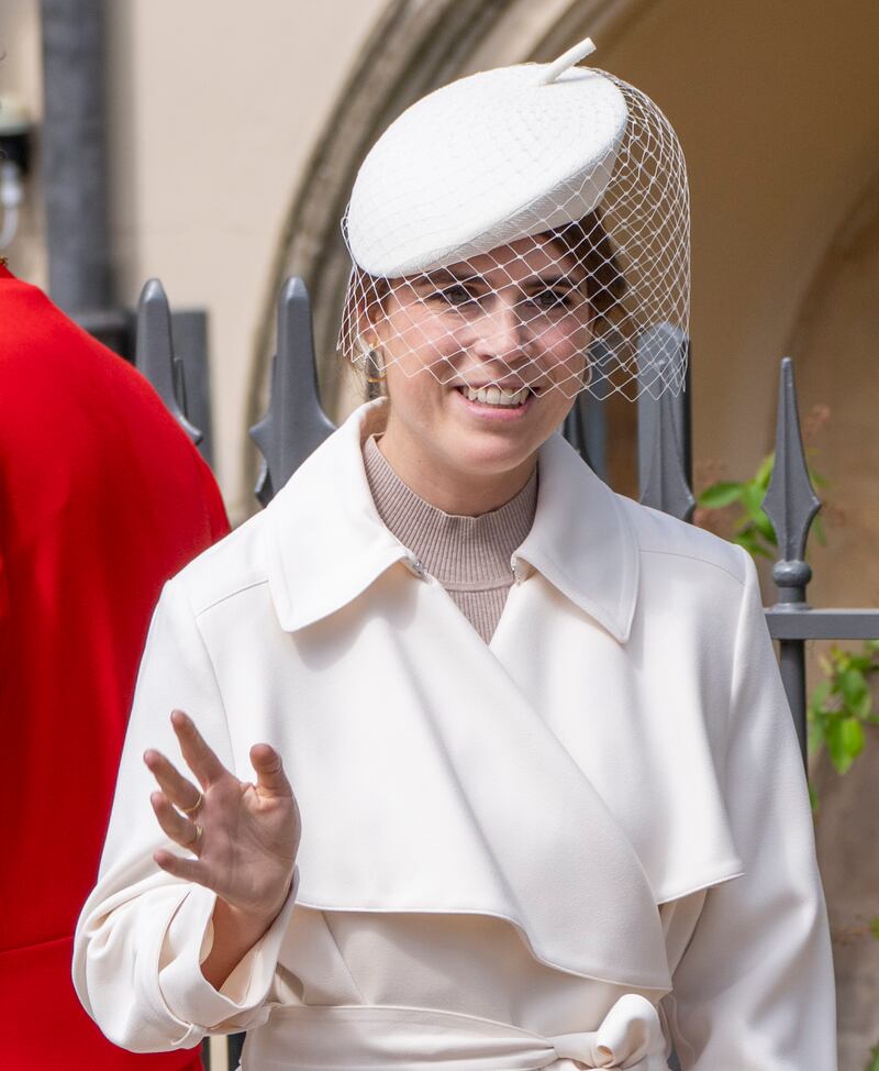 Princess Eugenie waves as she attends the traditional Easter Sunday Mattins Service at St George's Chapel on April 20, 2025 in Windsor, England.