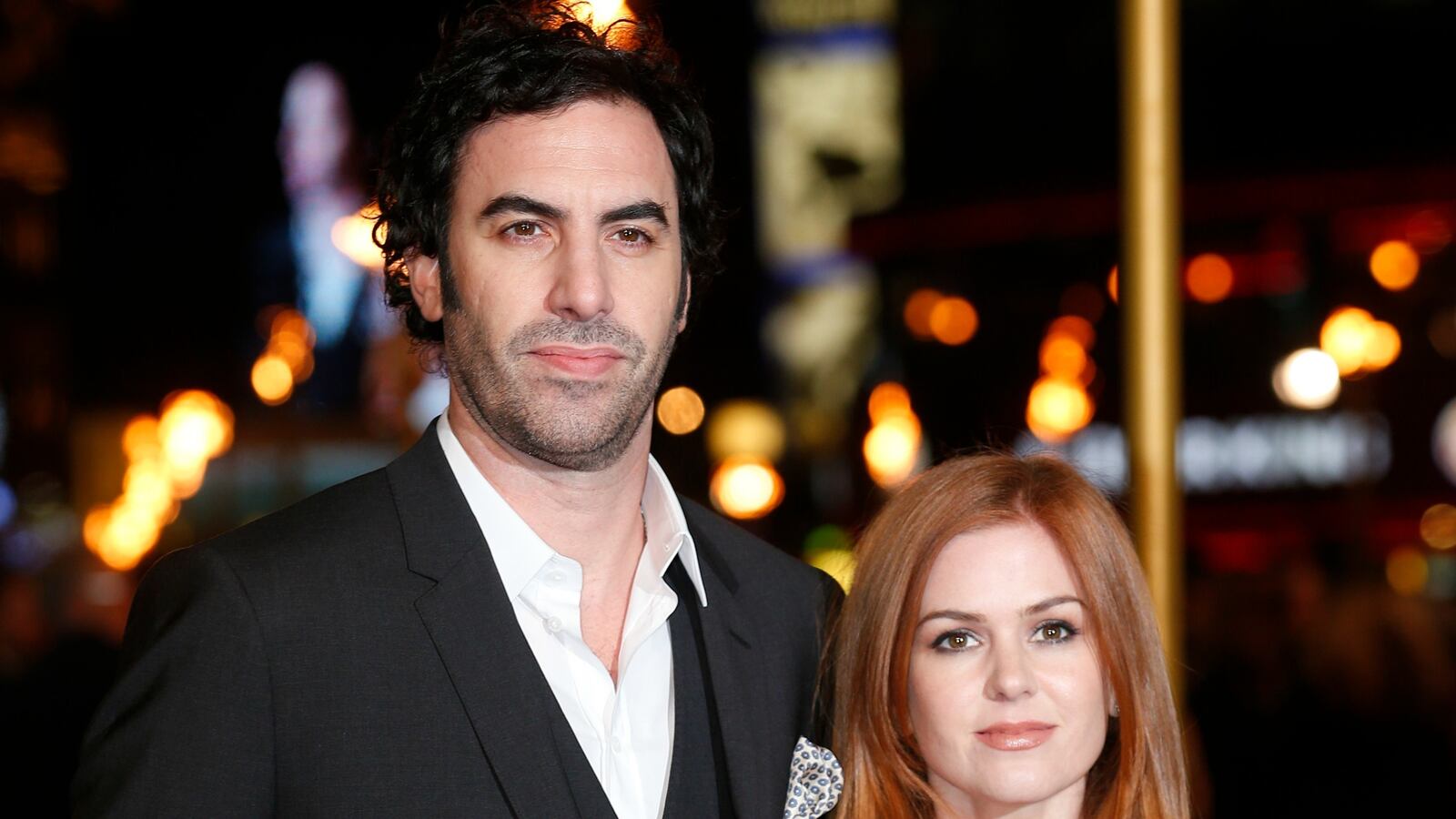 cheats/2015/12/27/sacha-baron-cohen-and-isla-fisher-give-1m-to-refugees/151227-sacha-isla-cheat_skstsb