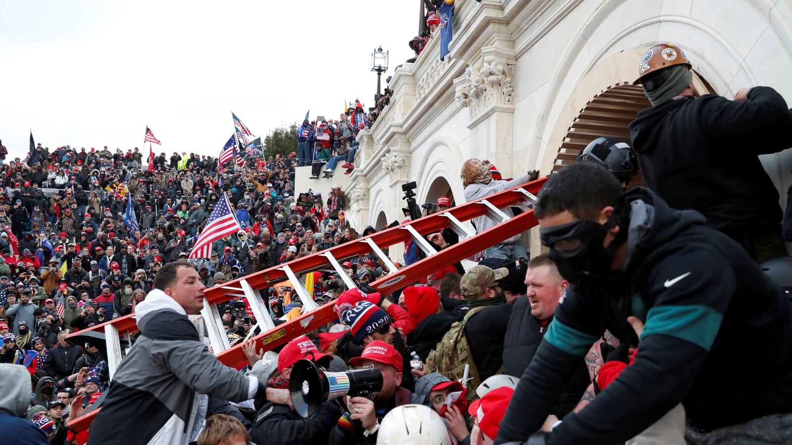 2021-06-08T005938Z_361658776_RC20WN9IRT7T_RTRMADP_3_USA-CAPITOL-REVIEW_lltn0r