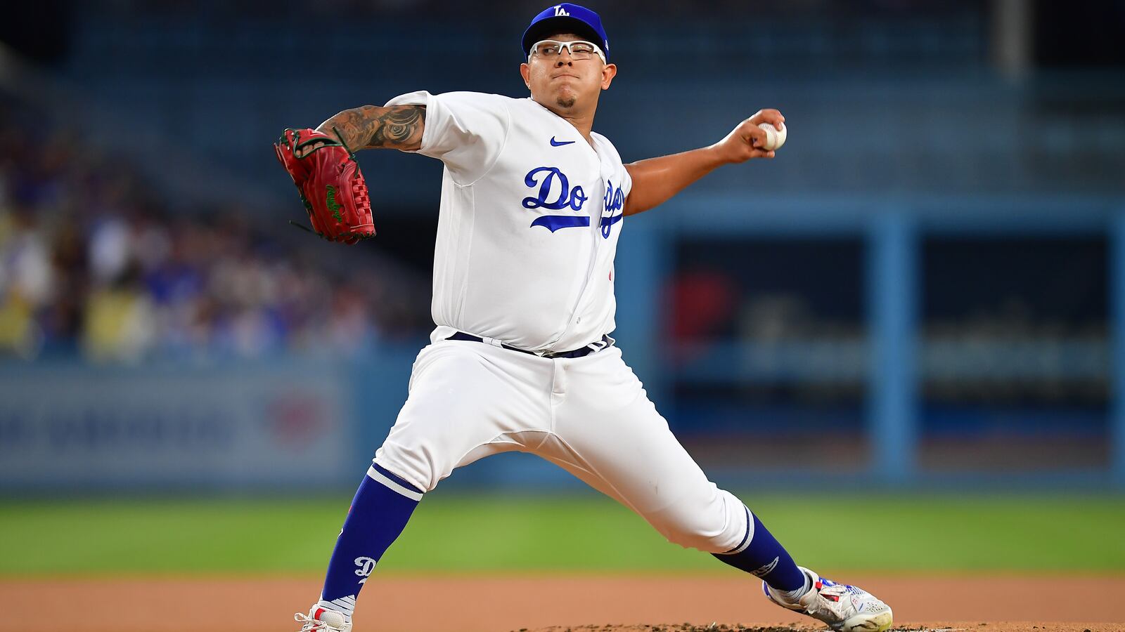 Los Angeles Dodgers starting pitcher Julio Urias (7) throws against the Atlanta Braves during the first inning at Dodger Stadium.