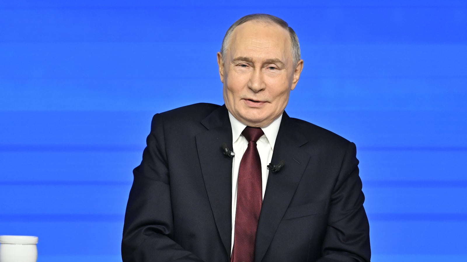 MOSCOW, RUSSIA - DECEMBER 19: Russia's President Vladimir Putin attends annual special televised question-and-answer session and year-end news conference scheduled to take place at the Gostiny Dvor in Moscow, Russia, on December 19, 2025. (Photo by Sefa Karacan/Anadolu via Getty Images)