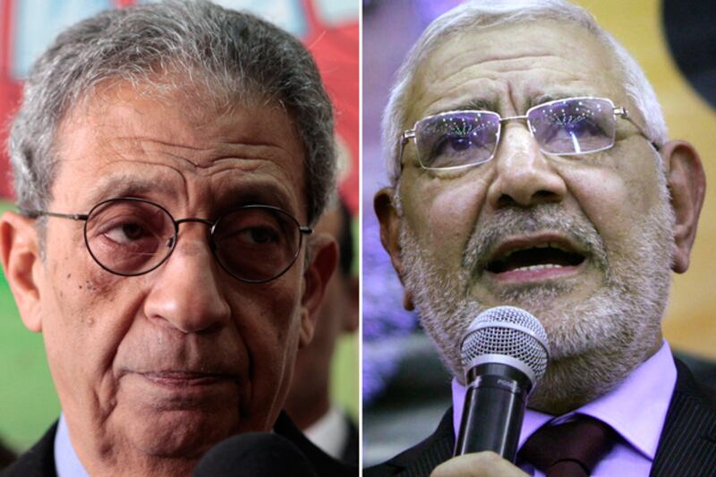 articles/2012/05/11/moussa-aboul-fotouh-spar-in-egypt-s-epic-first-presidential-debate/egypt-tv-debates-khalil_dizg2q