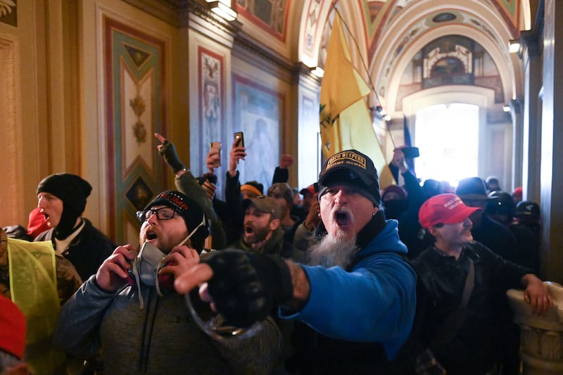n Washington, DC. - Demonstrators breeched security and entered the Capitol as Congress debated the a 2020 presidential election Electoral Vote Certification. (Photo by ROBERTO SCHMIDT / AFP) (Photo by ROBERTO SCHMIDT/AFP via Getty Images)