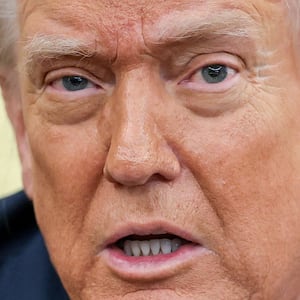 FILE PHOTO: U.S. President Donald Trump speaks as he meets with German Chancellor Friedrich Merz (not pictured) in the Oval Office at the White House in Washington, D.C., U.S., March 3, 2026. REUTERS/Jonathan Ernst/File Photo