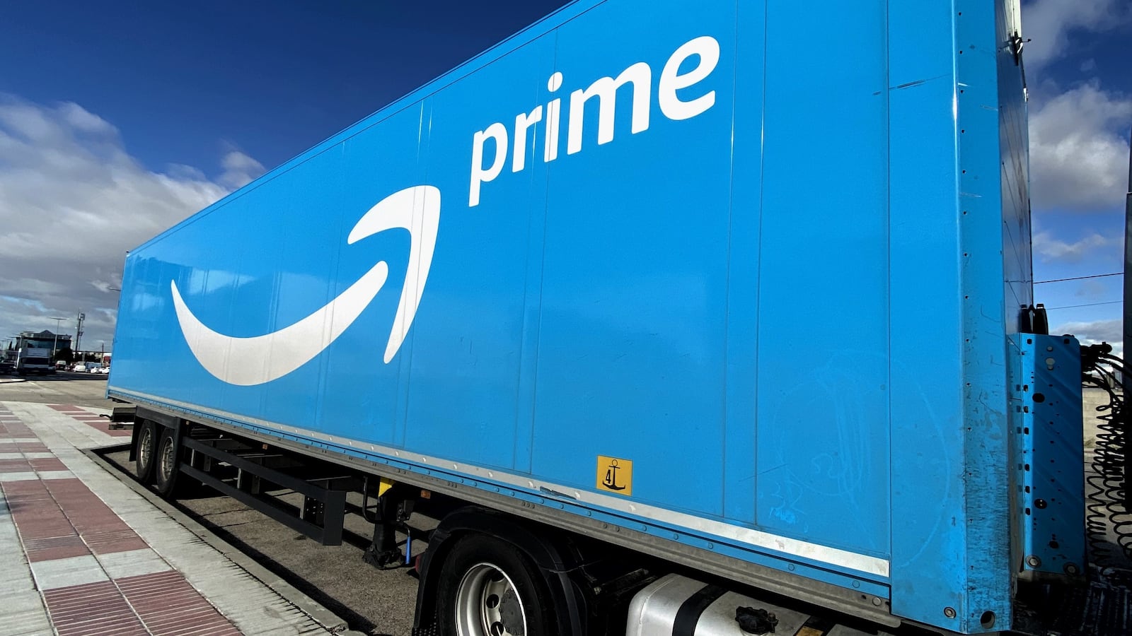 A truck of Amazon Prime parked.