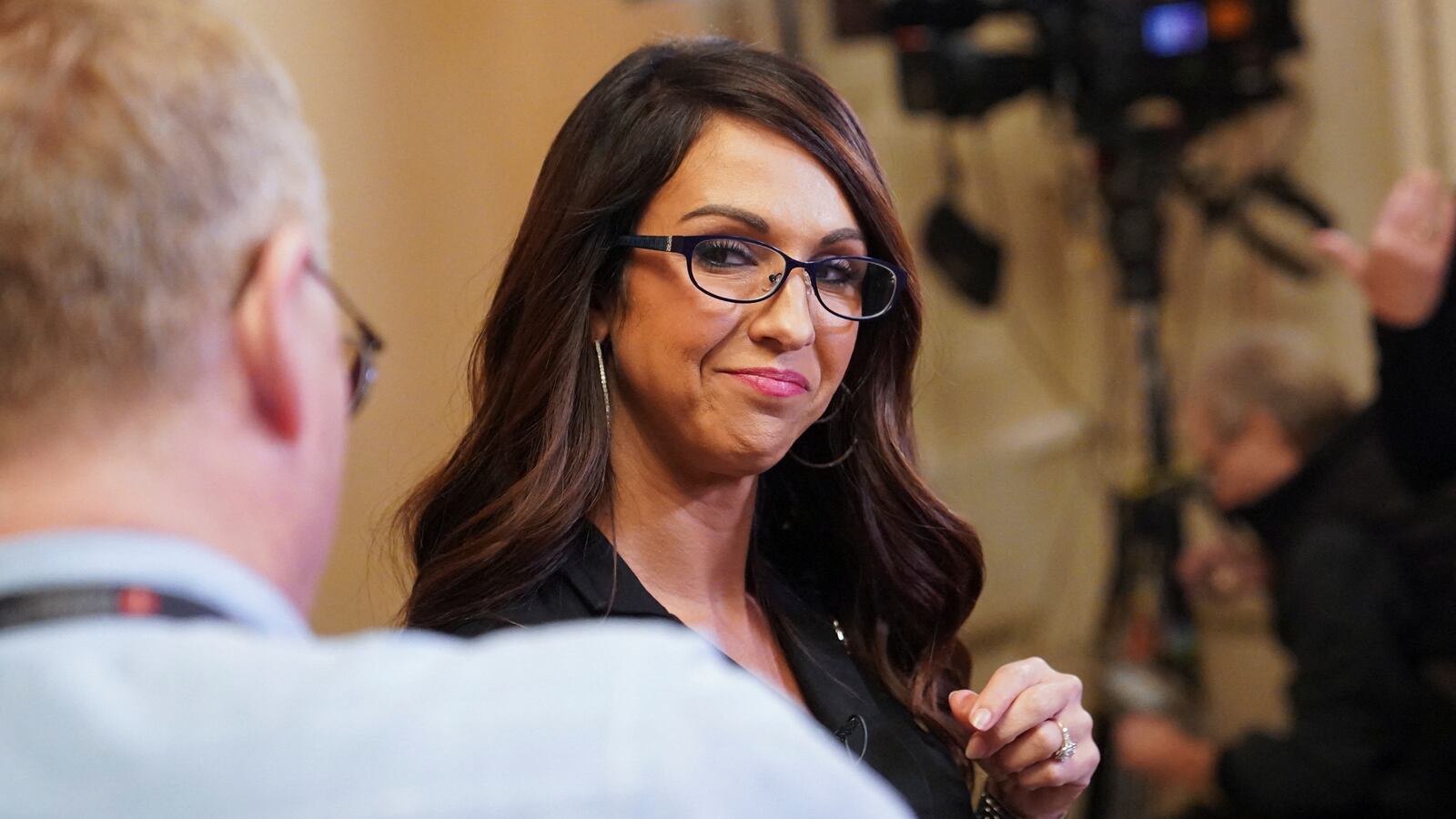 Rep. Lauren Boebert (R-CO) does a television interview upon leaving the House Chamber