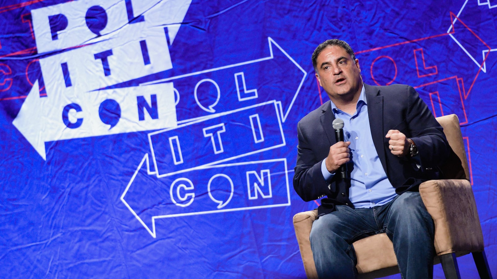 Cenk Uygur speaks during Politicon 2018.