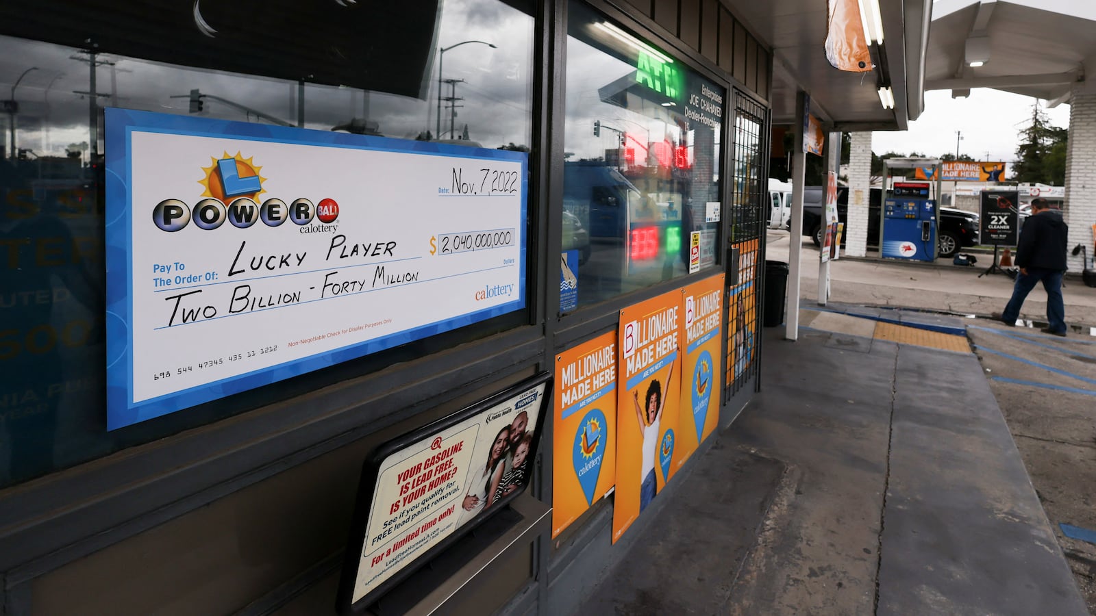 A display check is seen at Joe’s Service Center, where a single winning ticket for the Powerball lottery drawing was sold, in Altadena, California, Nov. 8, 2022.