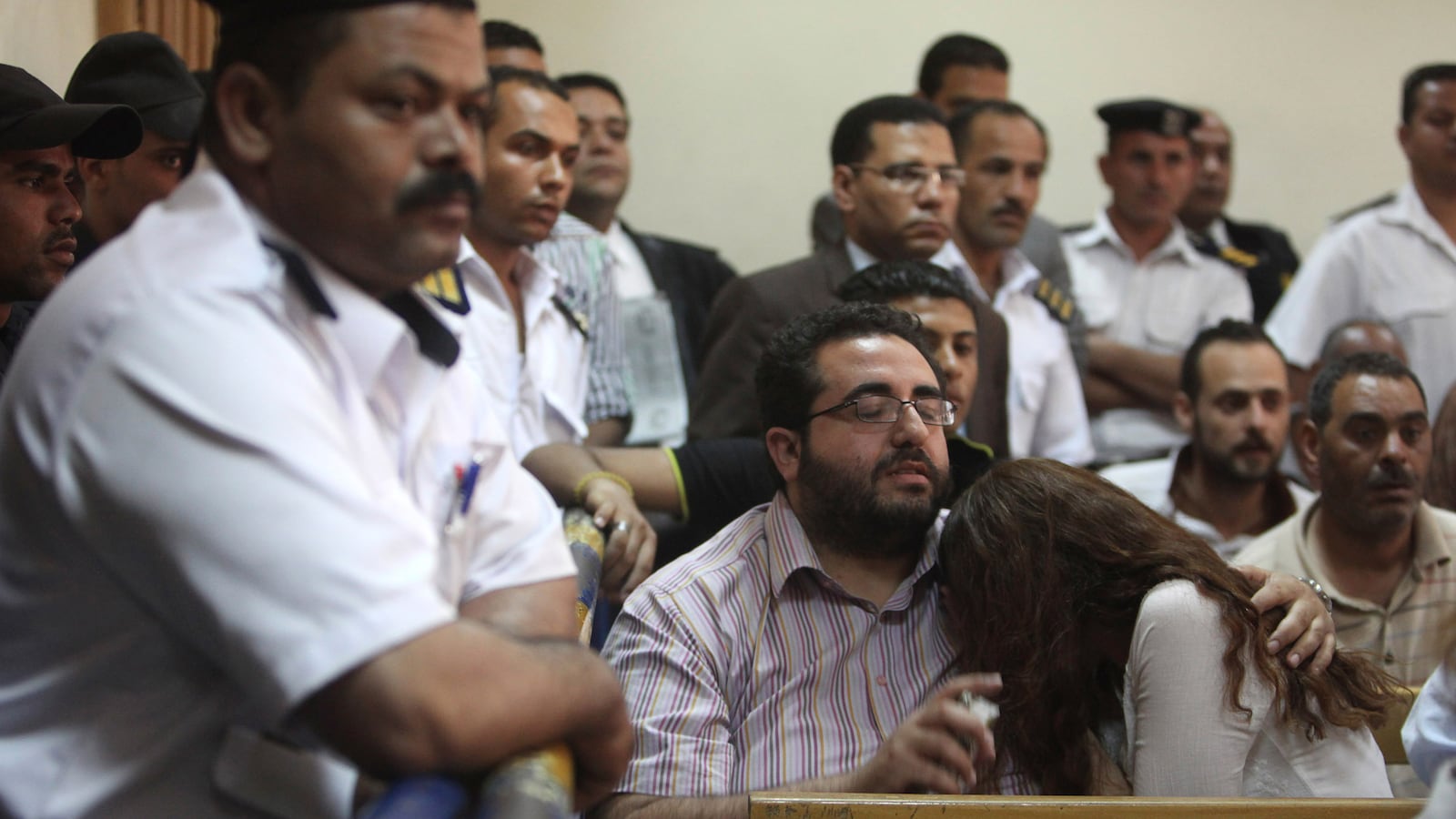 articles/2013/06/04/egypt-sentences-american-workers-to-jail-time/130604-egypt-trial-tease_hqffgc