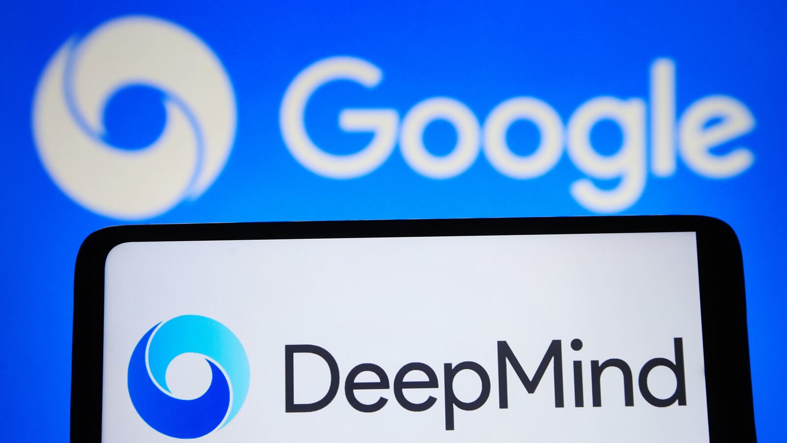 In this photo illustration, Google DeepMind logo is seen on a smartphone screen.