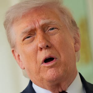 U.S. President Donald Trump speaks with the media after receiving a McDonald's order via DoorDash, which was delivered to him in front of the Oval Office at the White House in Washington, D.C., U.S., April 13, 2026. REUTERS/Jonathan Ernst