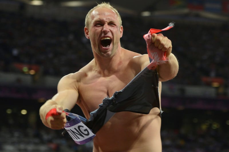 galleries/2012/08/10/nipple-slips-spandex-shocks-more-olympic-wardrobe-mishaps-photos/ripped-shirt-discus-olympic-wardrobe-malfunctions_dnnpdy