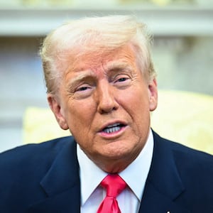 US President Donald Trump speaks to reporters.