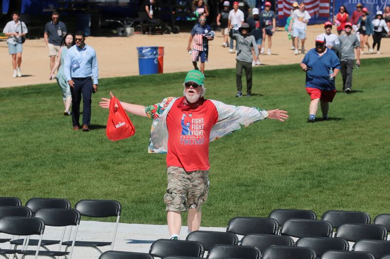People arrive to attend a rally kicking off the Great American State Fair marking the 250th anniversary of U.S. independence on the National Mall in Washington, D.C., U.S., June 24, 2026. REUTERS/Jonathan Ernst