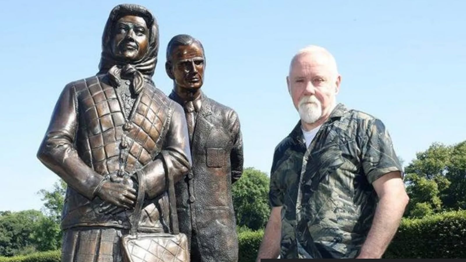 Belfast artist and sculptor Anto Brennan with his sculpture of Queen Elizabeth II and Prince Philip