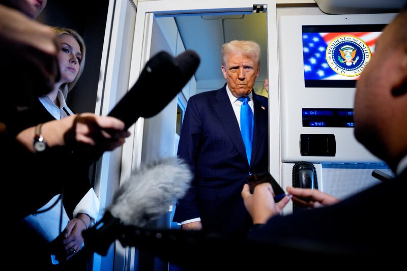 IN AIR, JAPAN - OCTOBER 29: U.S. President Donald Trump speaks to journalists aboard Air Force One en route to South Korea on October 29, 2025 in Japan. Trump is traveling to South Korea for the APEC meetings, following an appearance at the ASEAN summit in Malaysia, and a trip to Japan, where he called on Japanese Emperor Naruhito and new Prime Minister Sanae Takaichi. (Photo by Andrew Harnik/Getty Images)