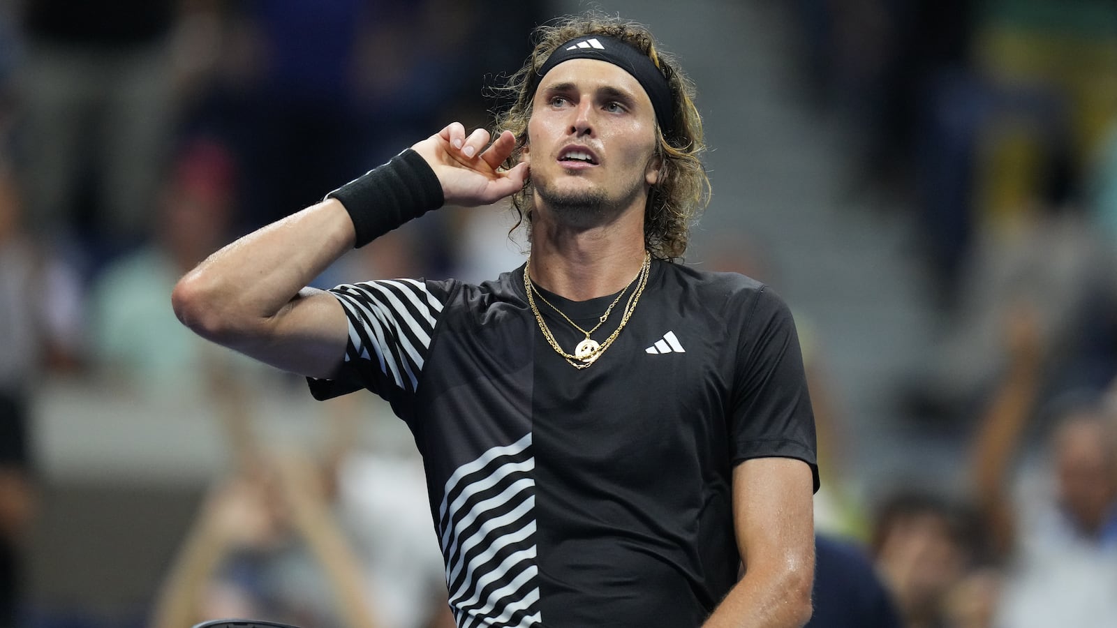Alexander Zverev of Germany reacts to winning a game against Jannik Sinner of Italy on day eight of the 2023 U.S. Open tennis tournament at USTA Billie Jean King National Tennis Center.