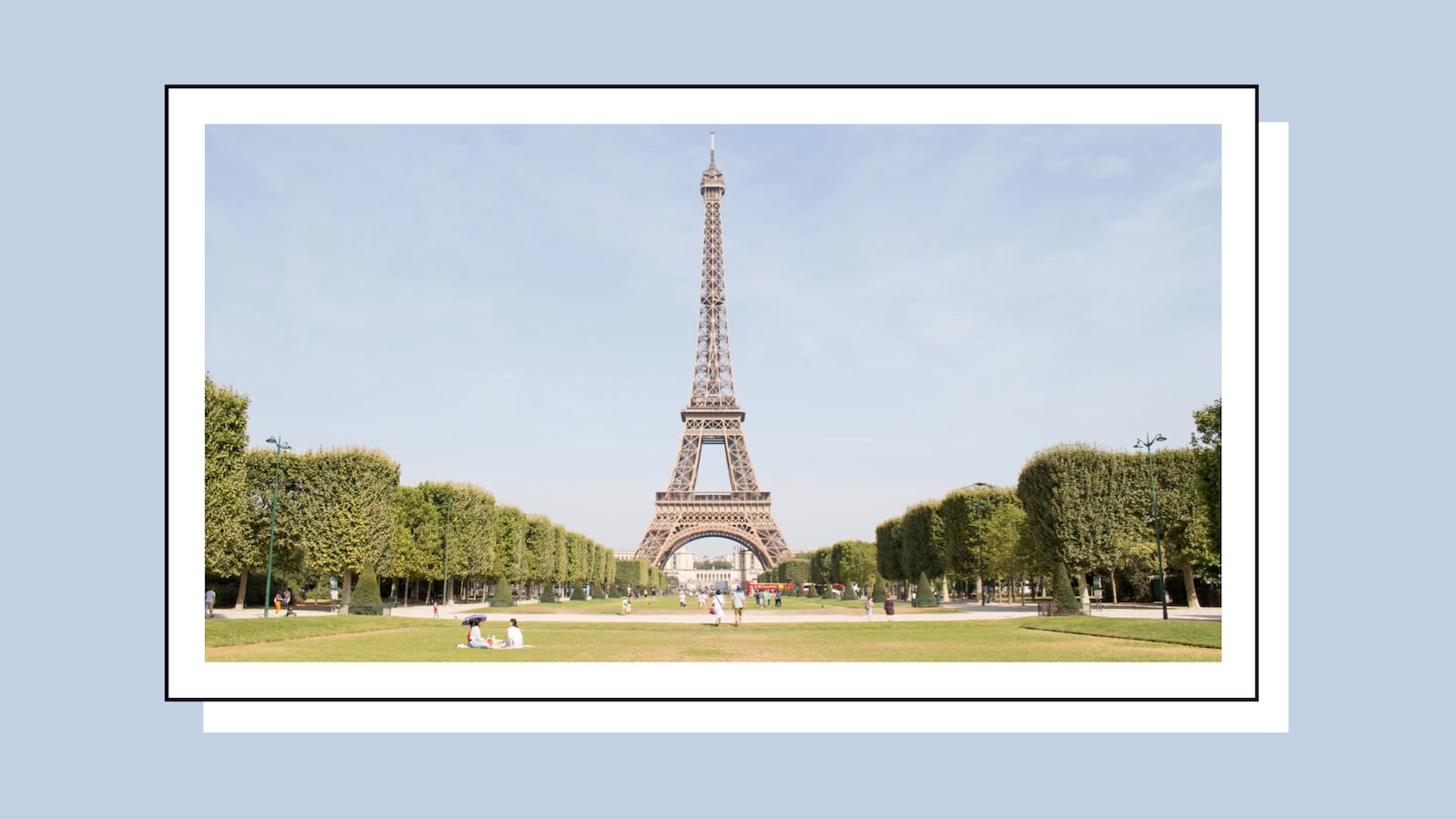 People gathering in front of the Eiffel Tower during the day