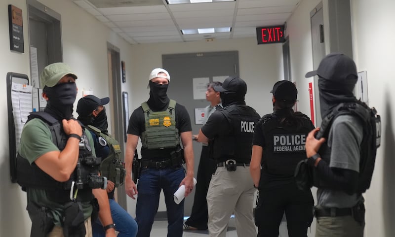 ICE agents wait to make arrests in New York City federal court.
