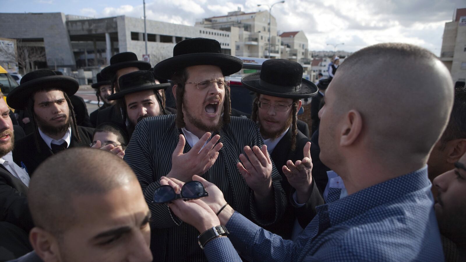 articles/2013/03/14/israel-s-ultra-orthodox-have-permission-to-believe/haredi-hiloni-openz_tmd3wm