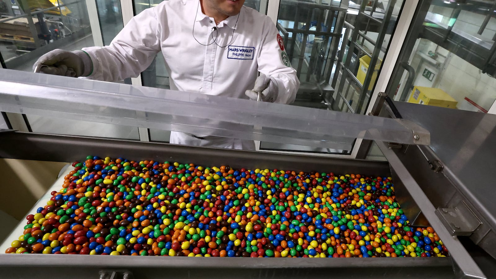 M&M chocolate candies in a factory.