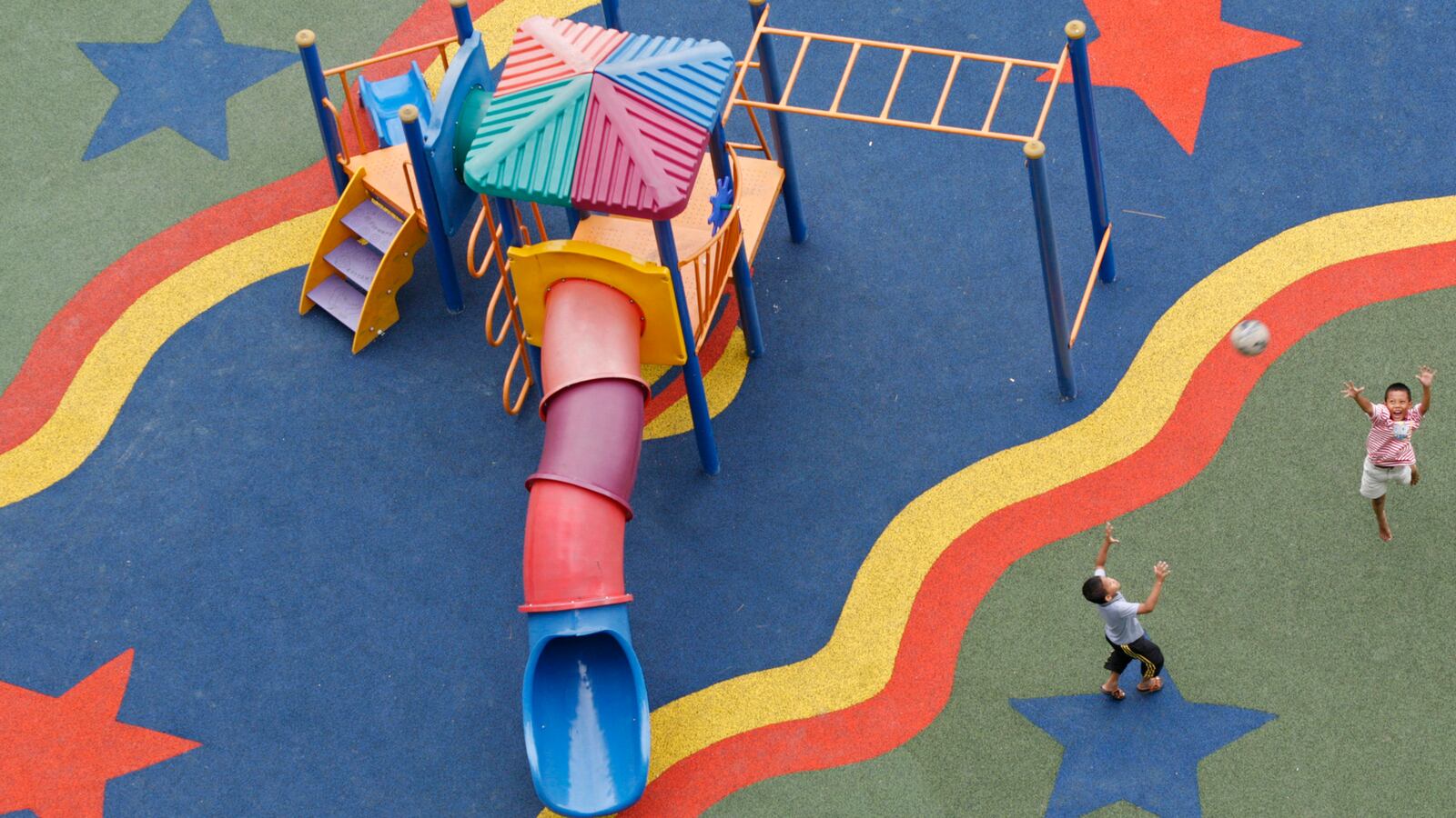 Children play at a playground.
