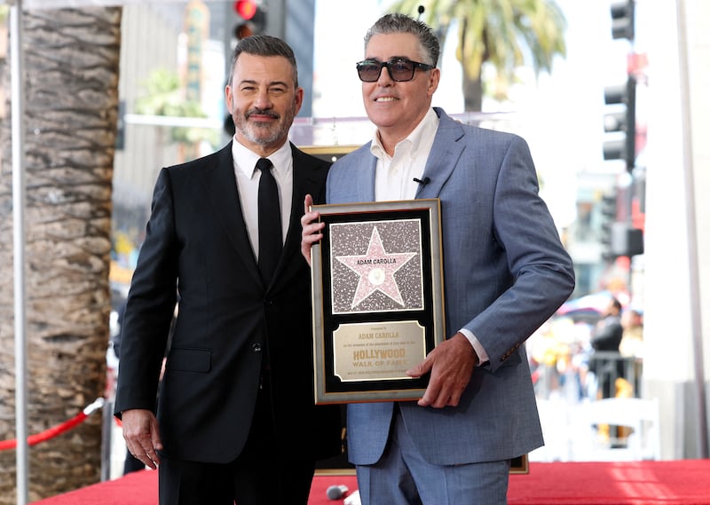 Adam Carolla poses with Jimmy Kimmel