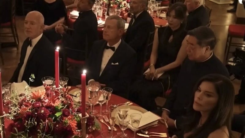 Jeff Bezos and wife Lauren Sanchez were snapped seated apart, with Bezos next to Chief Justice John Roberts and Sanchez seated next to Xi's deputy He Lifeng