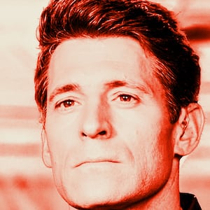 Tony Dokoupil with a blinking CBS eye logo