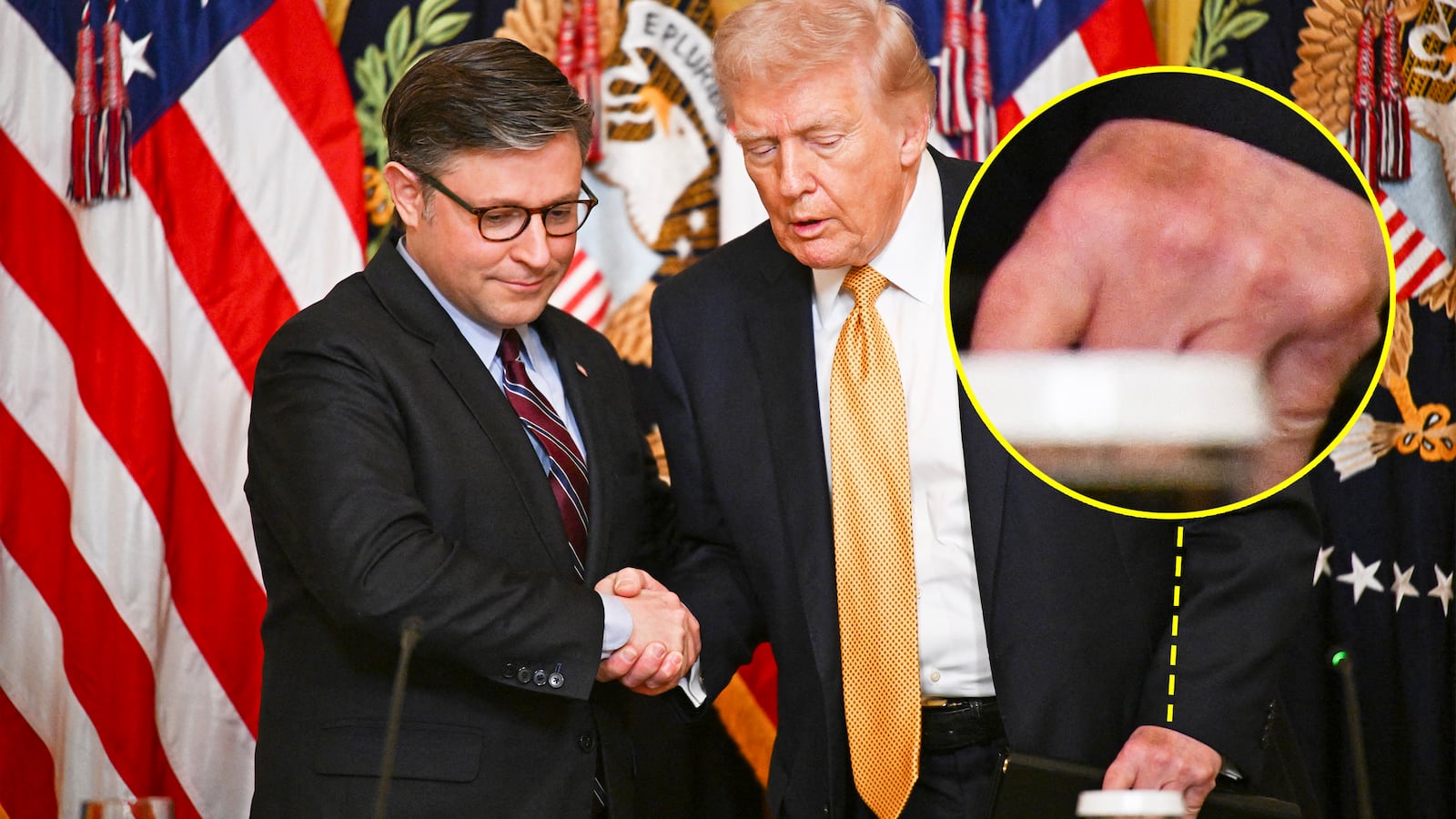 US President Donald Trump shakes hands with US Speaker of the House Mike Johnson (L), Republican from Louisiana as he arrives during a lunch with the Kennedy Center Board Members in the East Room of the White House on March 16, 2026 in Washington, DC. (Photo by Annabelle GORDON / AFP via Getty Images)