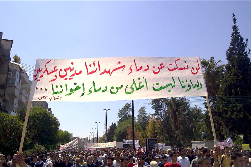 articles/2011/12/13/the-syrian-army-seems-to-be-on-the-brink-of-attacking-the-city-of-homs/syria-homs-protests-harkin_ozei1e