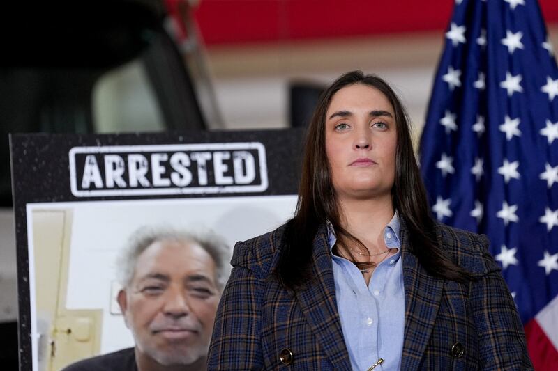 Immigration and Customs Enforcement (ICE) Deputy Director Madison Sheahan attends a press conference about 'Operation Midway Blitz', an immigration enforcement campaign, from a hangar in Gary, Indiana, U.S., October 30, 2025.