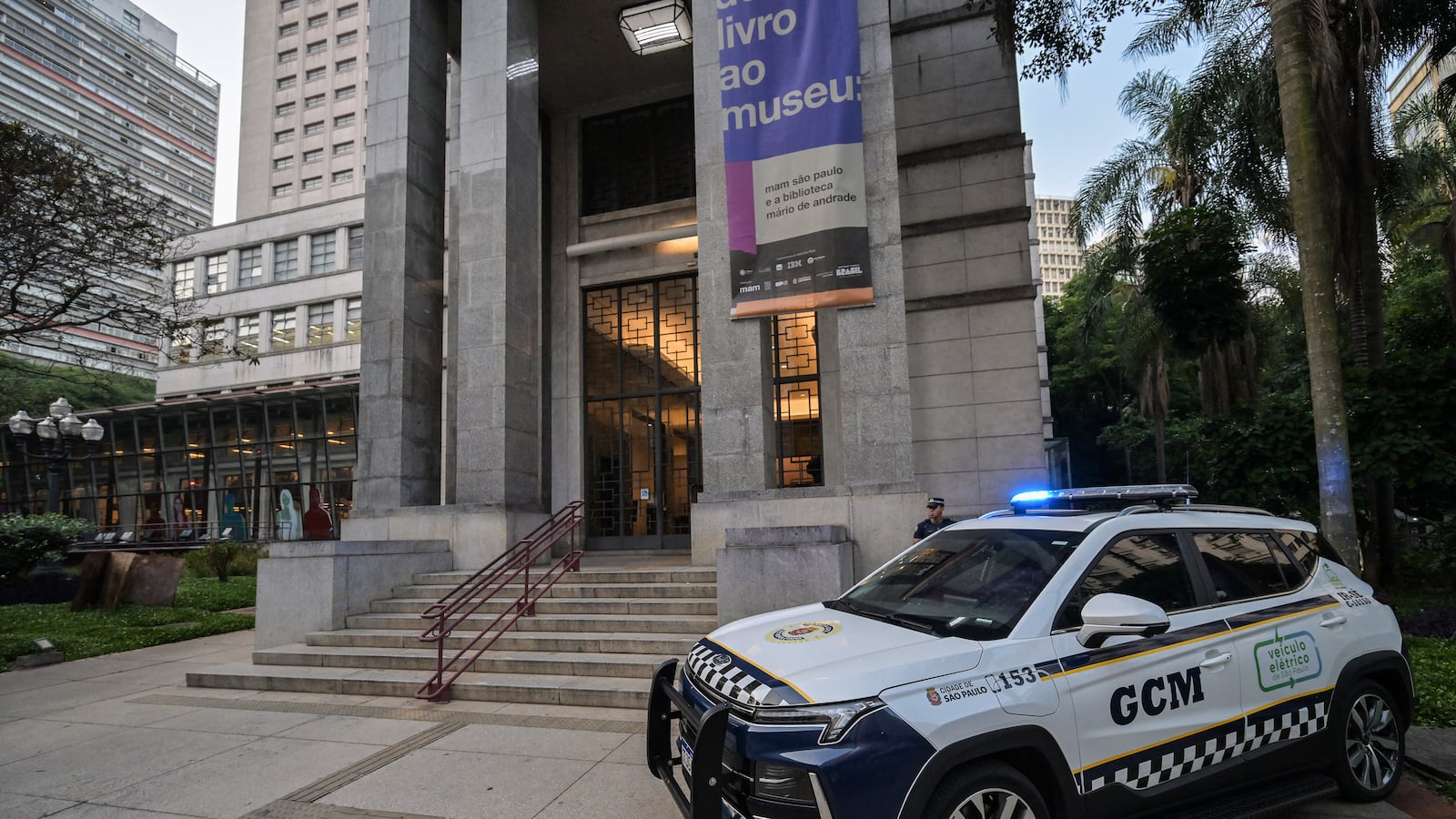 A Brazilian police patrol stands in front of the Mario de Andrade Public Library in downtown Sao Paulo, Brazil on December 7, 2025. Eight engravings by the French artist Henri Matisse were stolen from a library in Sao Paulo, the Brazilian city's government said Sunday. (Photo by Nelson ALMEIDA / AFP via Getty Images)