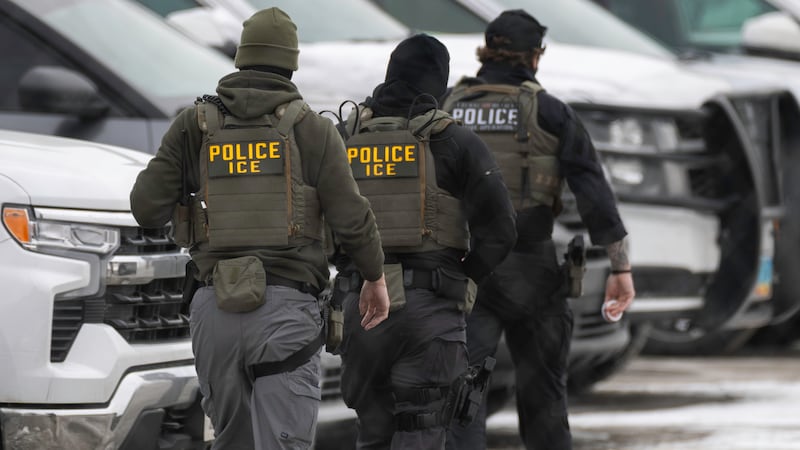 ICE agents depart the Bishop Henry Whipple Federal Building on February 4, 2026 in Minneapolis, Minnesota.