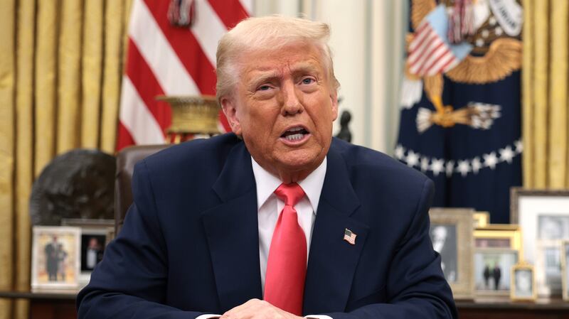 President Donald Trump speaks before signing executive orders in the Oval Office of the White House.