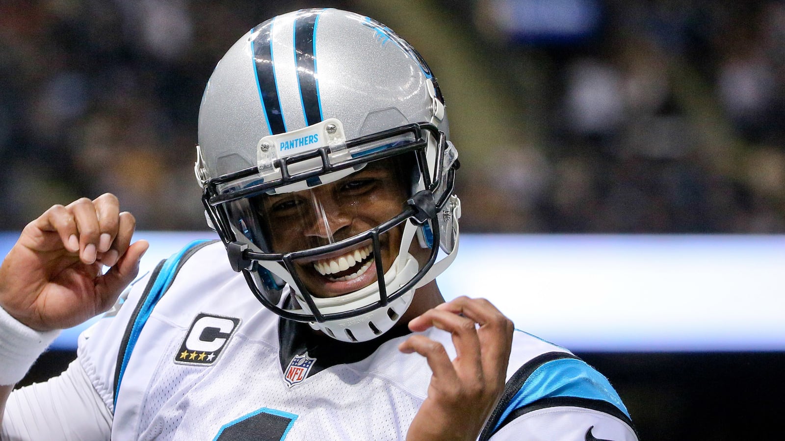 articles/2016/02/06/the-unapologetic-blackness-of-cam-newton/160205-taylor-newton-tease_yjcjgq