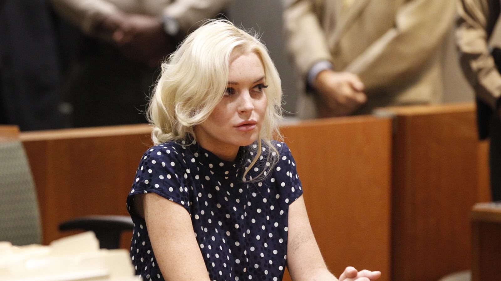 cheats/2012/09/30/congressional-staffer-freed-after-lohan-incident/lindsay-lohan-timeline-tease-update_waxowg